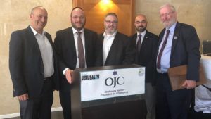 Duvi Honig (second from left), founder and CEO of the Orthodox Chamber of Commerce at the Anglo-Israeli/American Jerusalem Expo and Conference. Credit: Orthodox Jewish Chamber of Commerce. 