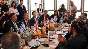 Florida Gov. Ron DeSantis (left) meets with Israeli Strategic Affairs Minister Gilad Erdan, as well as small-business owners and community leaders, at the Hub Etzion co-working space and small-business center in Gush Etzion on May 29, 2019. Credit: Shannon Nuszen.