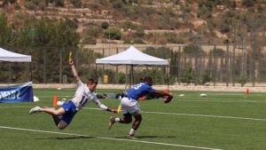 A member of the Israeli team goes for the flag. Photo by Shannon Nuszen. 