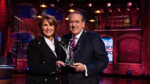 Laurie Cordoza-Moore, president of Proclaiming Justice to the Nations, with former Arkansas Gov. Mike Huckabee. Source: Facebook via PJTN. 