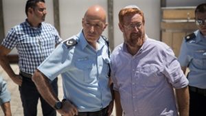 Commander of the Jerusalem District Police Doron Yedid with former Knesset member Yehuda Glick at the Western Wall Plaza near the Mughrabi Bridge in the Old City of Jerusalem after clashes broke out on the Temple Mount and around its gates, as Jews mark Tisha B'Av and Muslims celebrate Eid al-Adha, on Aug. 11, 2019. Photo by Hadas Parush/Flash90.