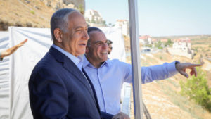 Israeli prime minister Benjamin Netanyahu with Efrat mayor Oded Revivi during a visit to Efrat, in the Gush Etzion area of Judea on July 31, 2019. Photo by Gershon Elinson/Flash90.