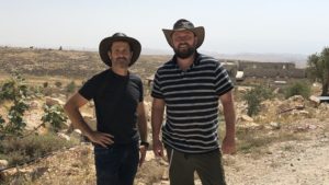 Jeremy Gimpel (left) and Ari Abramowitz on their property, Arugot Farms, in the Judean Desert. Photo by Josh Hasten.