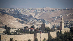 A view of the Old City walls and the surroundings, including the Church of Dormition, from a rooftop in Jerusalem, Sept. 7, 2018. Photo by Yonatan Sindel/Flash90.