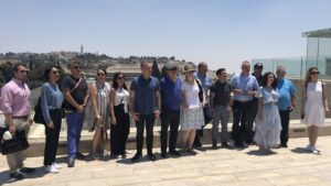 Ambassadors from several nations pose at the Aish HaTorah Center in the Old City of Jerusalem overlooking the Western Wall. Photo by Josh Hasten. 