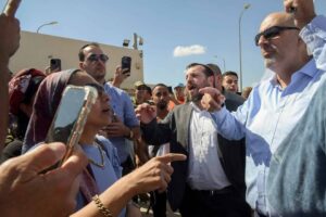 Israeli Heritage Minister Amichai Eliyahu and Knesset member Nissim Vaturi attend a protest against the detention of IDF reservists suspected of assaulting a Hamas terrorist at the Sde Teiman military base near Beersheva, July 29, 2024. Photo by Dudu Greenspan/Flash90.